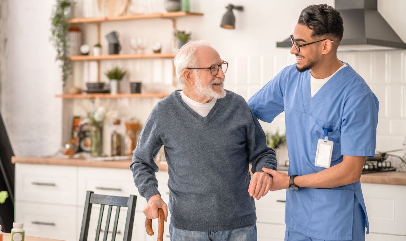 nurse assisting senior